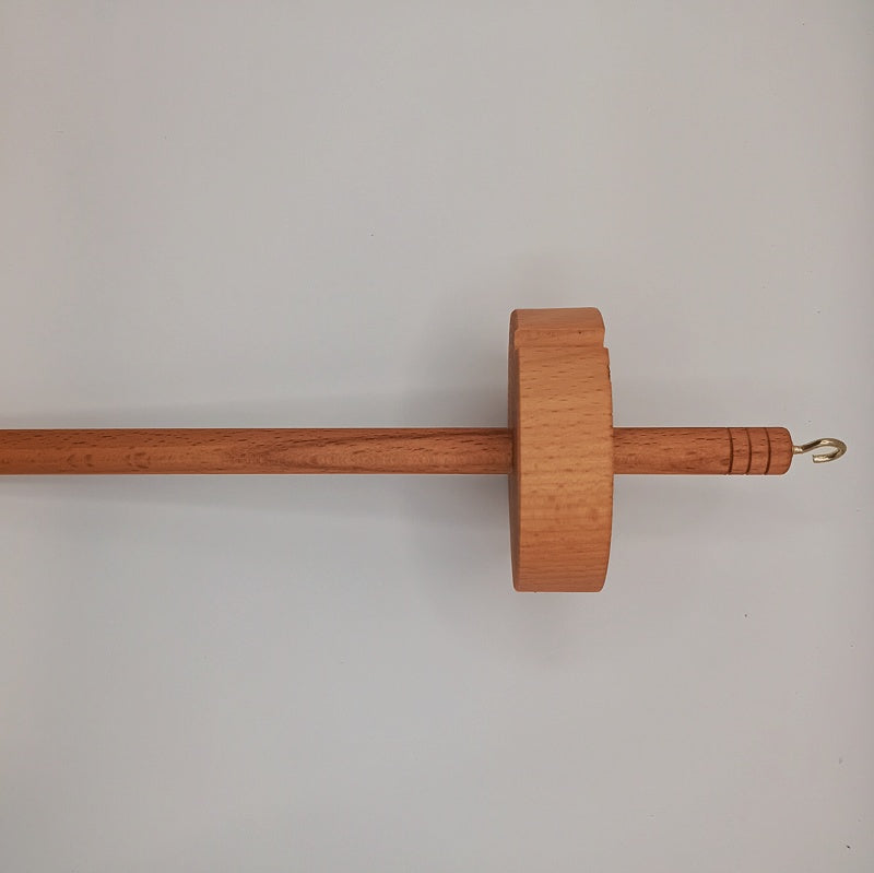 drop spindle for spinning wool into yarn