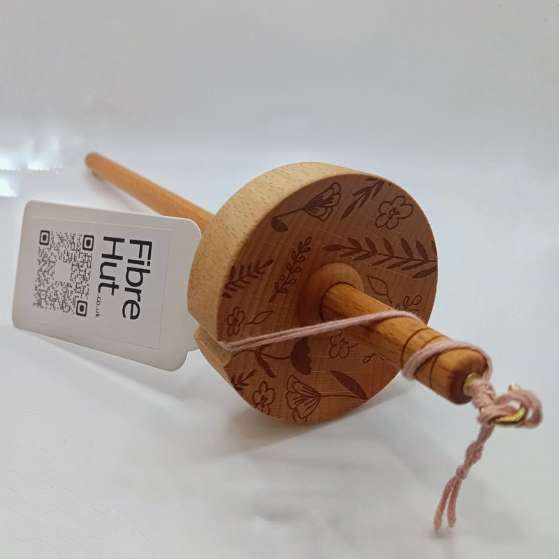 drop spindle for spinning wool into yarn