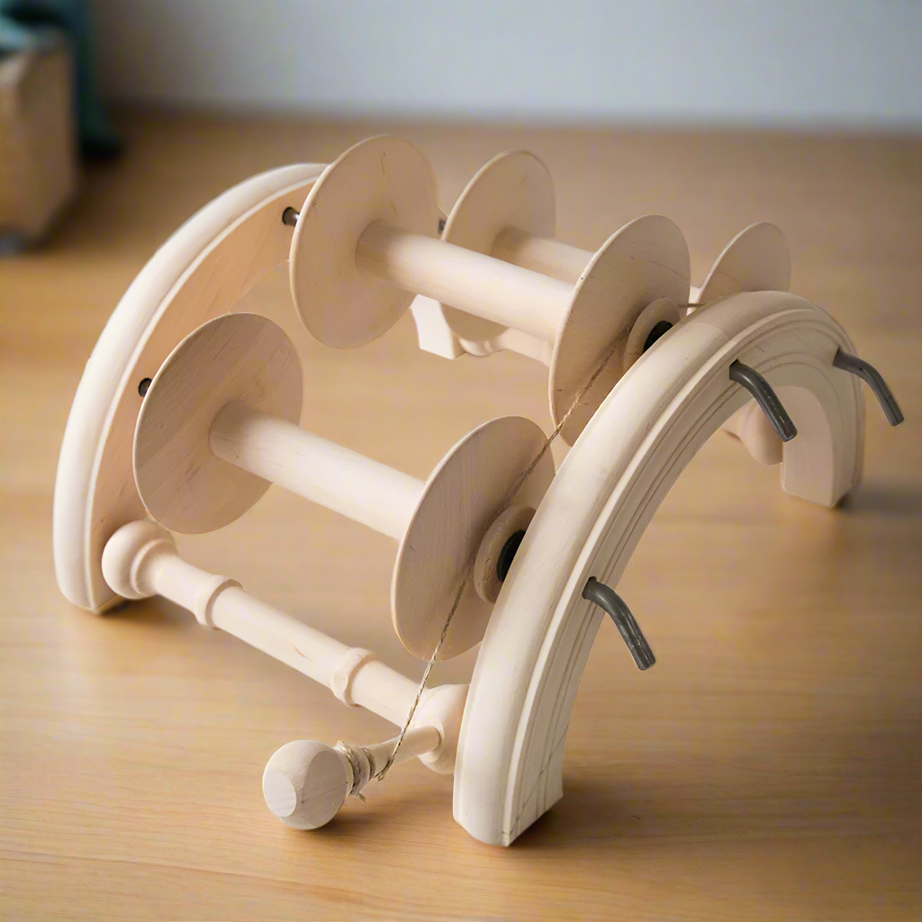 Lazy kate with spinning wheel bobbins