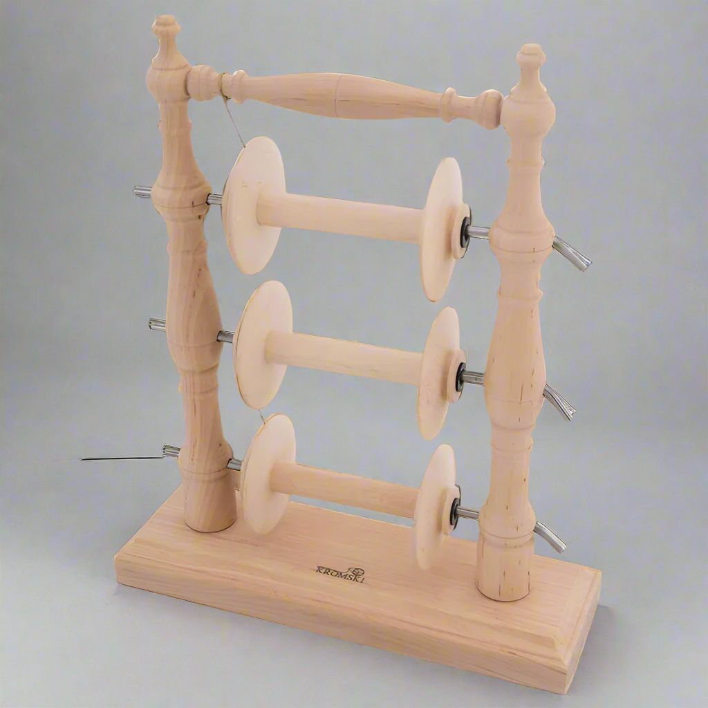 Lazy kate with spinning wheel bobbins