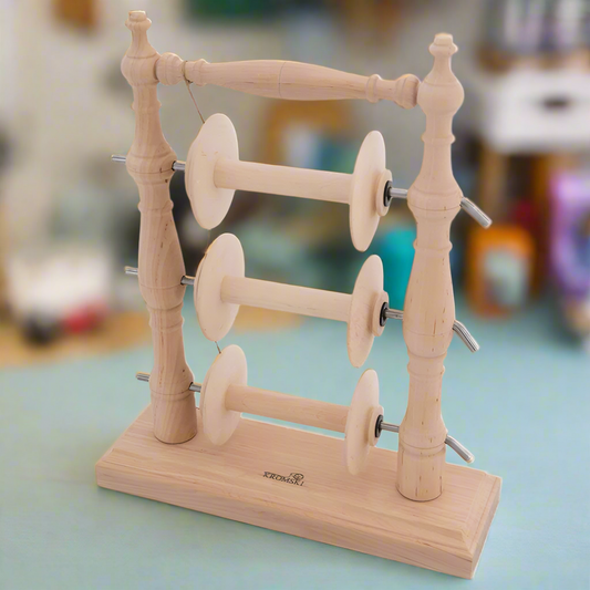 Lazy kate with spinning wheel bobbins