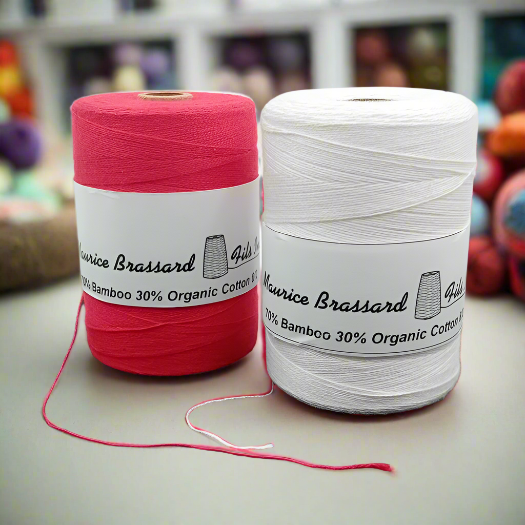 Maurice Brassard weaving yarn