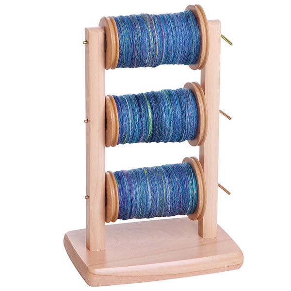 Lazy kate and 3 bobbins comes with the Ashford Traditional wheel