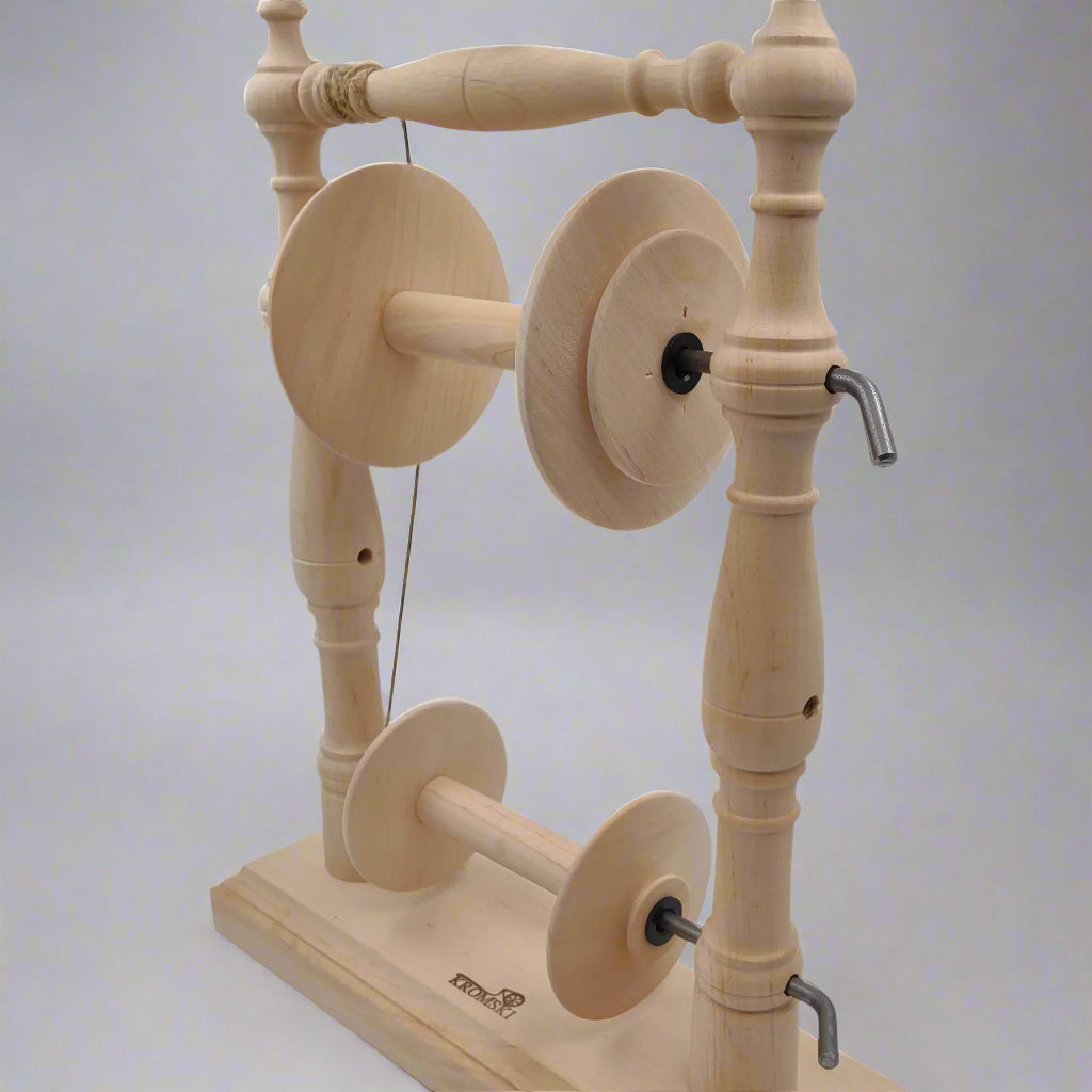 Lazy kate with spinning wheel bobbins