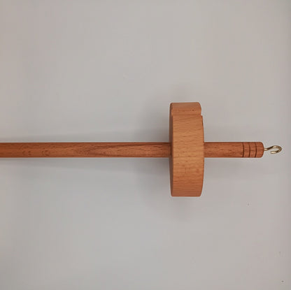 drop spindle for spinning wool into yarn