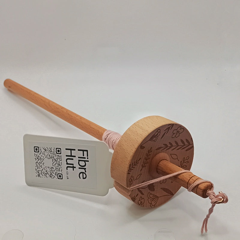 drop spindle for spinning wool into yarn