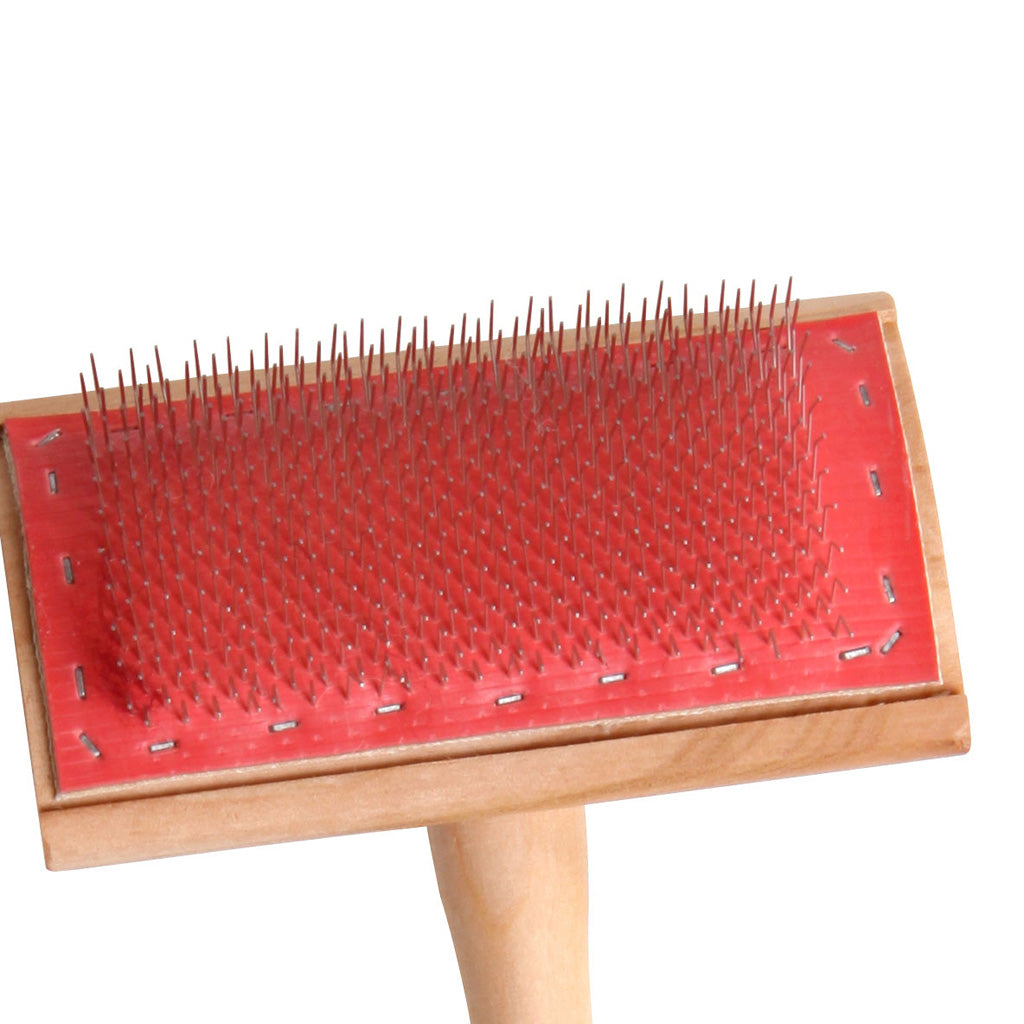 flick carder brush