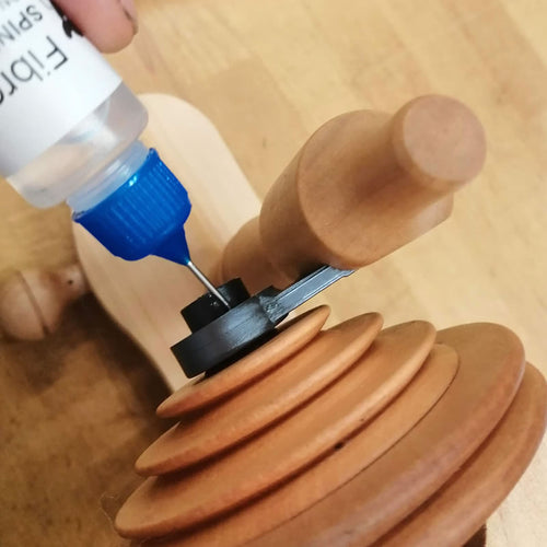spinning wheel flyer and bobbin oil