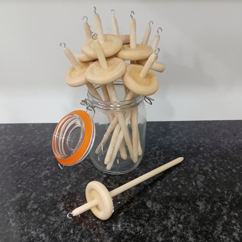 spinning yarn on a drop spindle